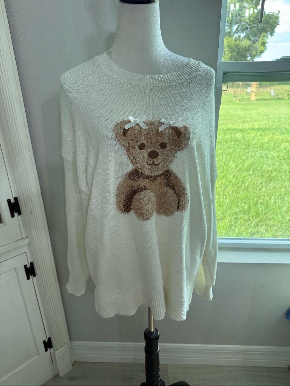 Sincerly Jules Cream Knit Sweater with Brown Teddy Bear Graphic